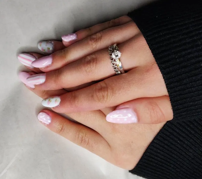 Almond. Spring nails, Extension. Design on all nails and one solid colour